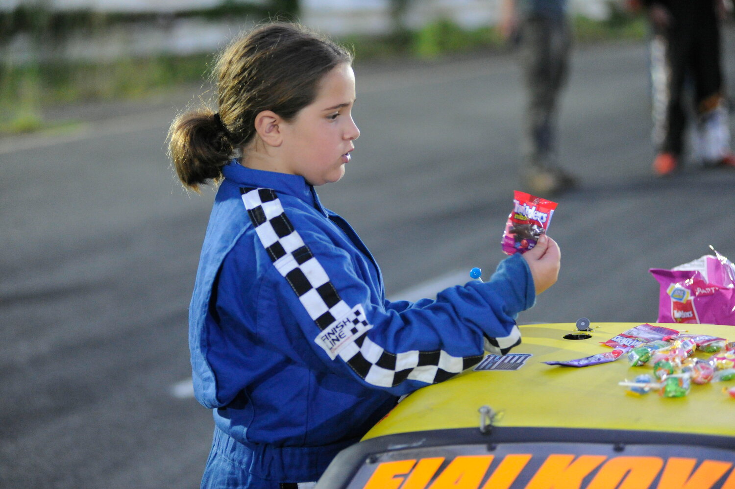 Girl racer. Young women are a regular sight at the wheel at Bethel Motor Speedway...